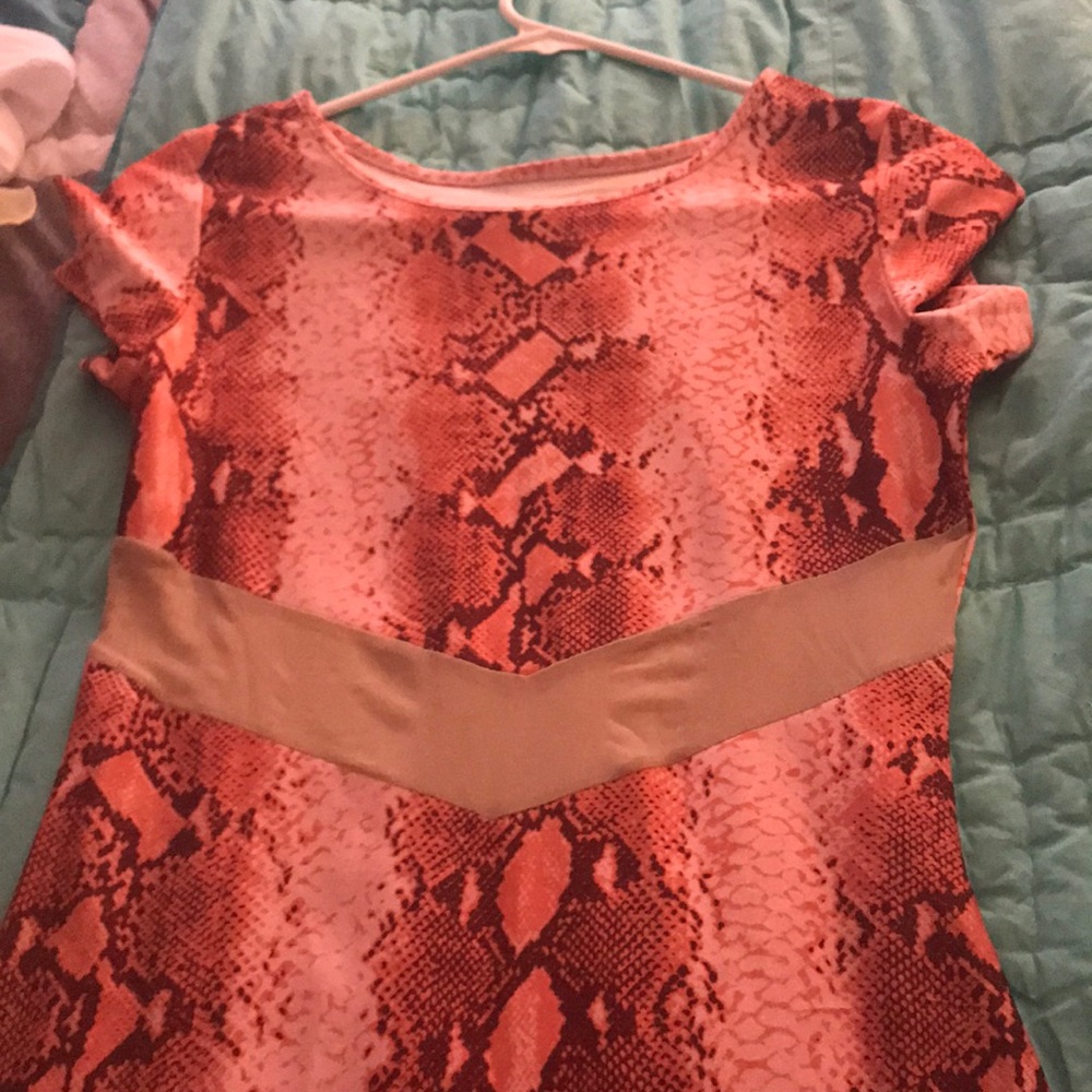 Snake print body con dress